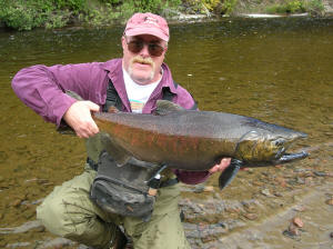 Jeff Novak shows off a 15 lb male Pinook Salmon caught on the Garden River